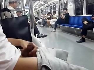 Jerking off on a crowded metro train